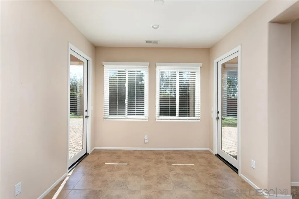 1757 Monte Mar Road Vista, CA 92084 - Photo 10 of 25 an empty room with a window