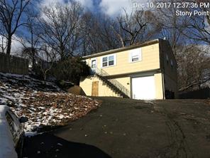 43 Park Road Stony Point, NY 10980 - Photo 1 of 1 a view of a large tree in front of a house