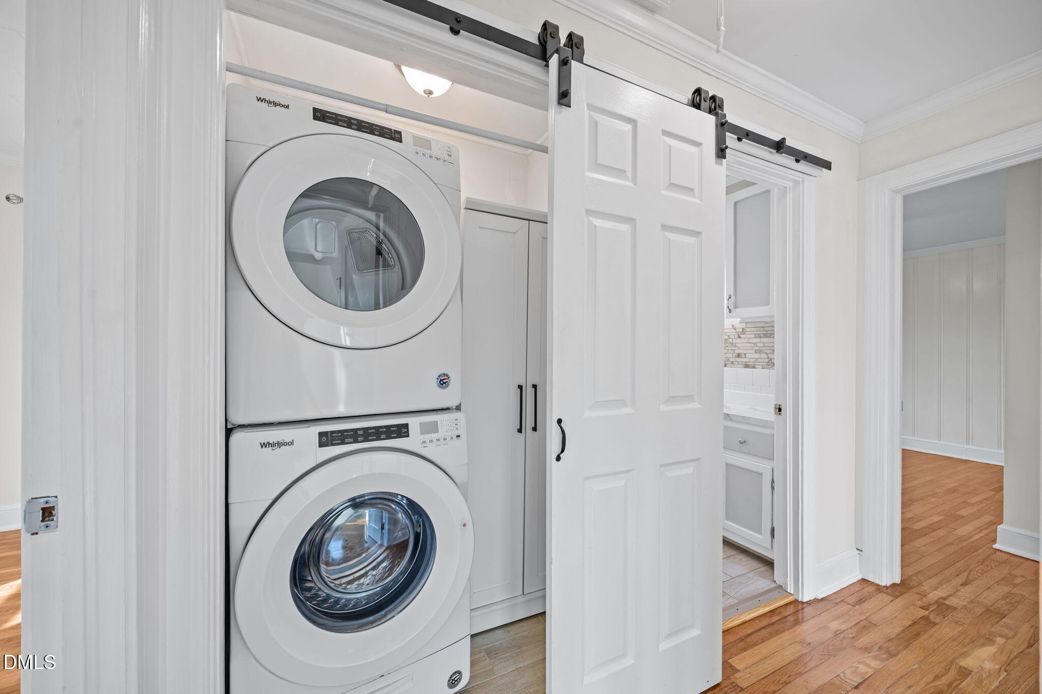 10612 Durham Road Timberlake, NC 27583 - Photo 23 of 42 a view of a hallway with washer and dryer