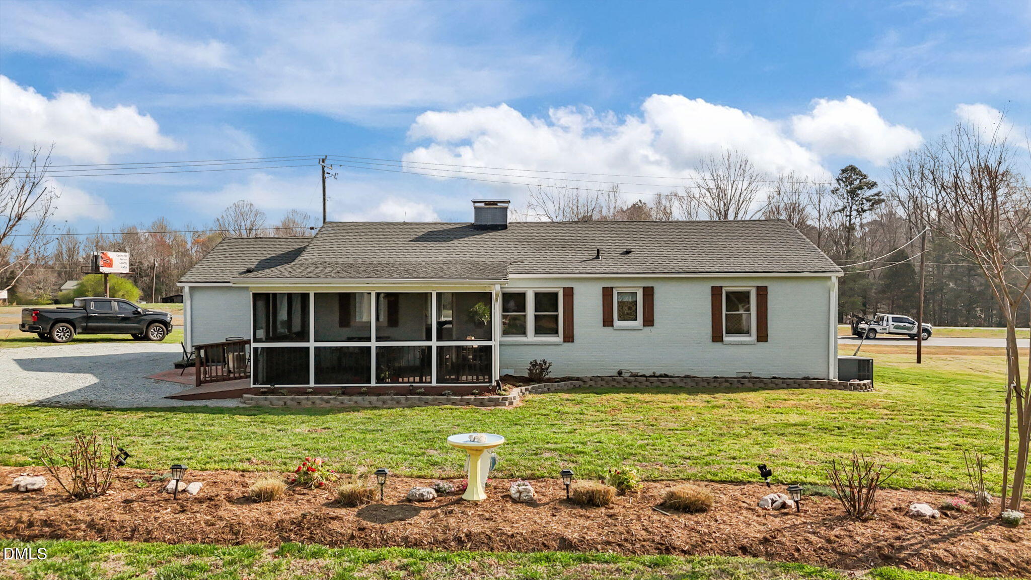 10612 Durham Road Timberlake, NC 27583 - Photo 28 of 42 a front view of a house with garden