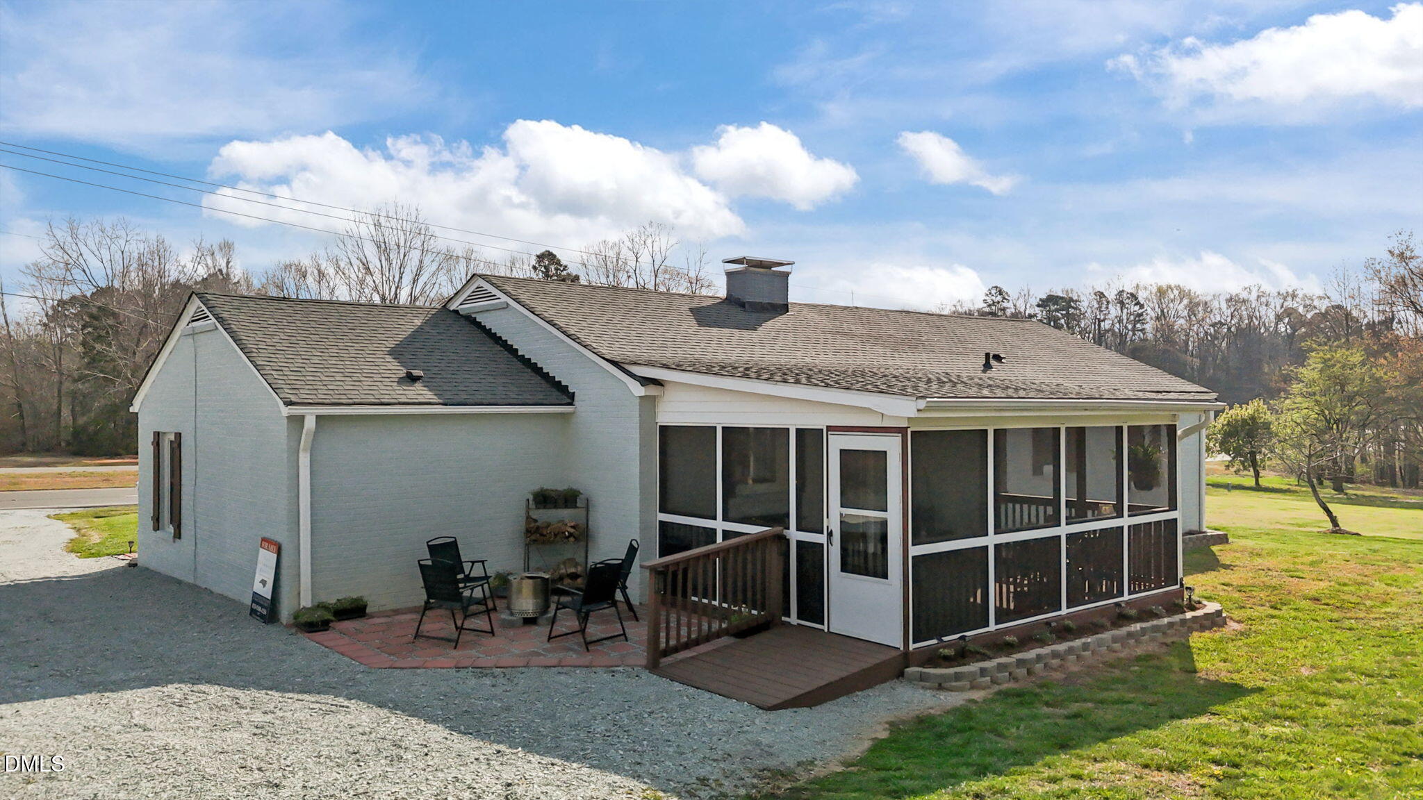 10612 Durham Road Timberlake, NC 27583 - Photo 29 of 42 a view of a house with a yard and sitting area