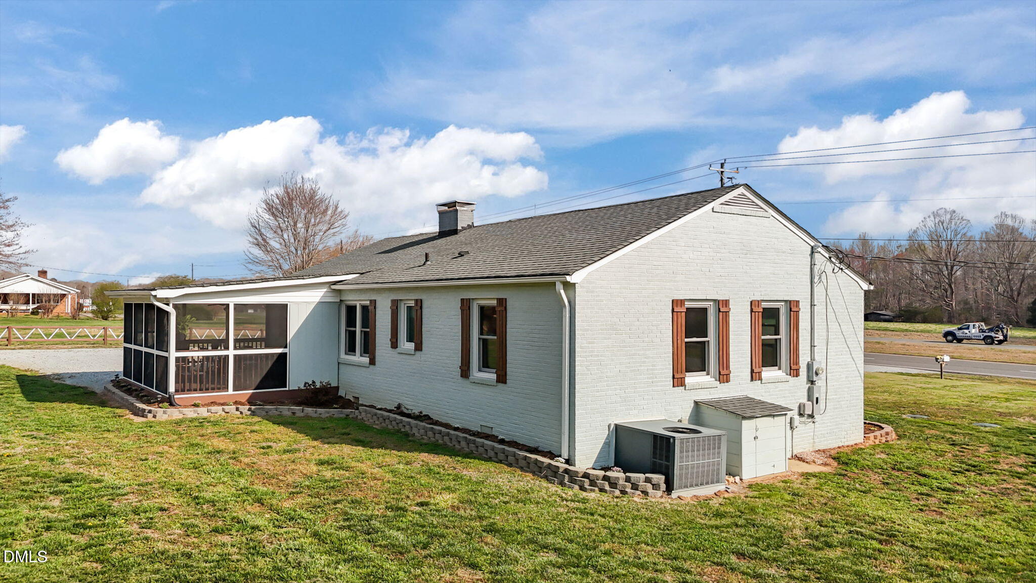 10612 Durham Road Timberlake, NC 27583 - Photo 30 of 42 a view of a house with a yard