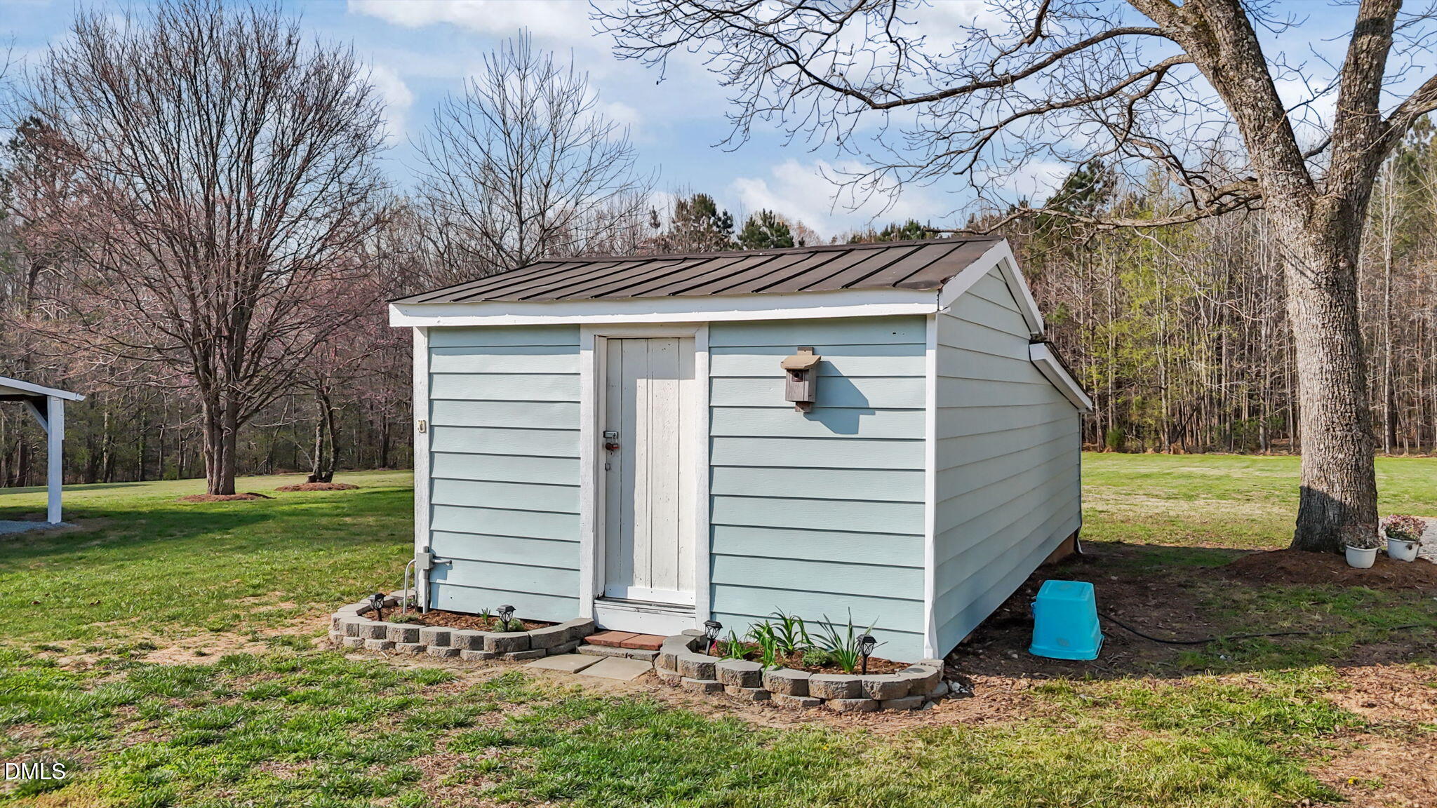 10612 Durham Road Timberlake, NC 27583 - Photo 31 of 42 a view of a back yard of the house