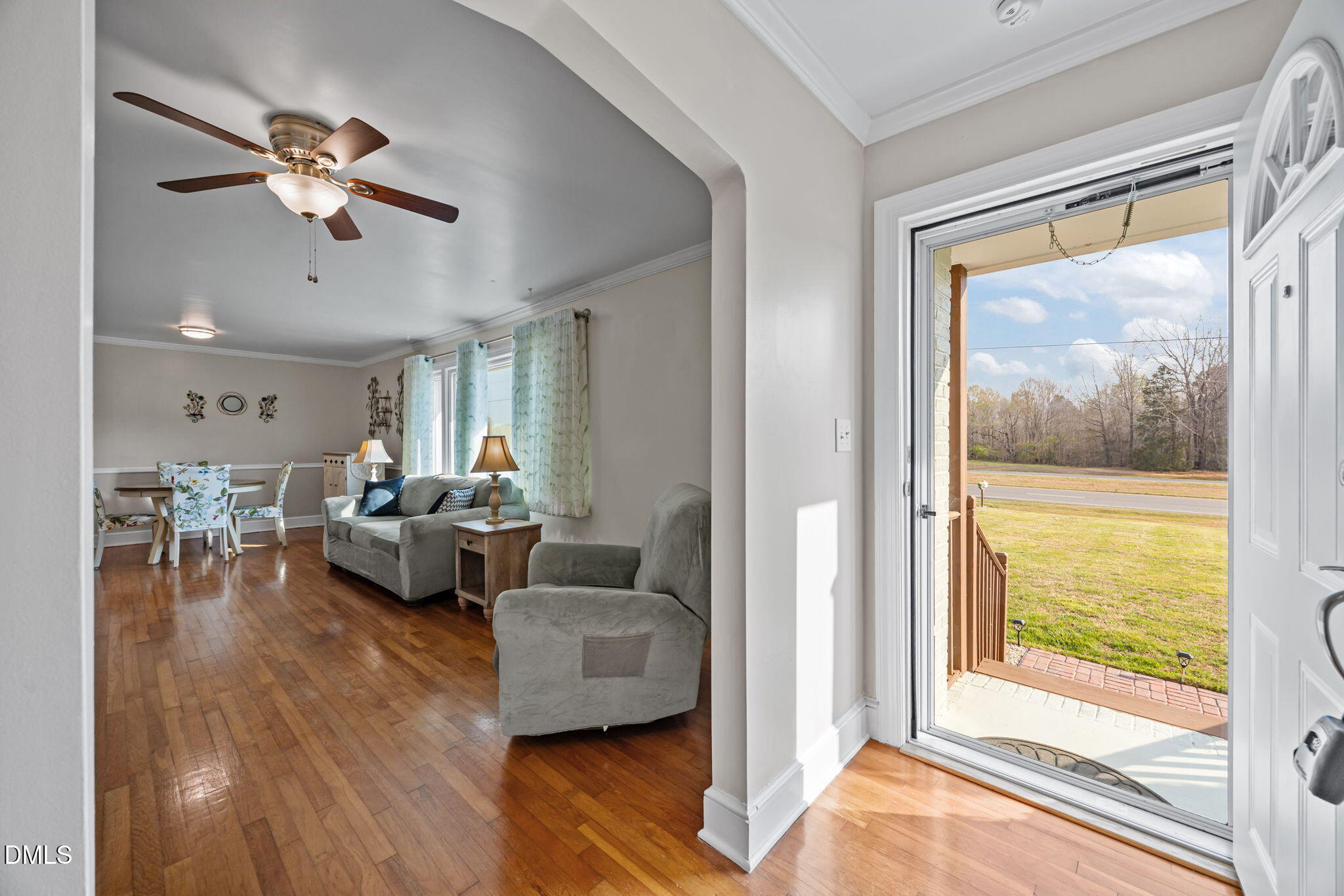 10612 Durham Road Timberlake, NC 27583 - Photo 5 of 42 a living room with furniture and a large window
