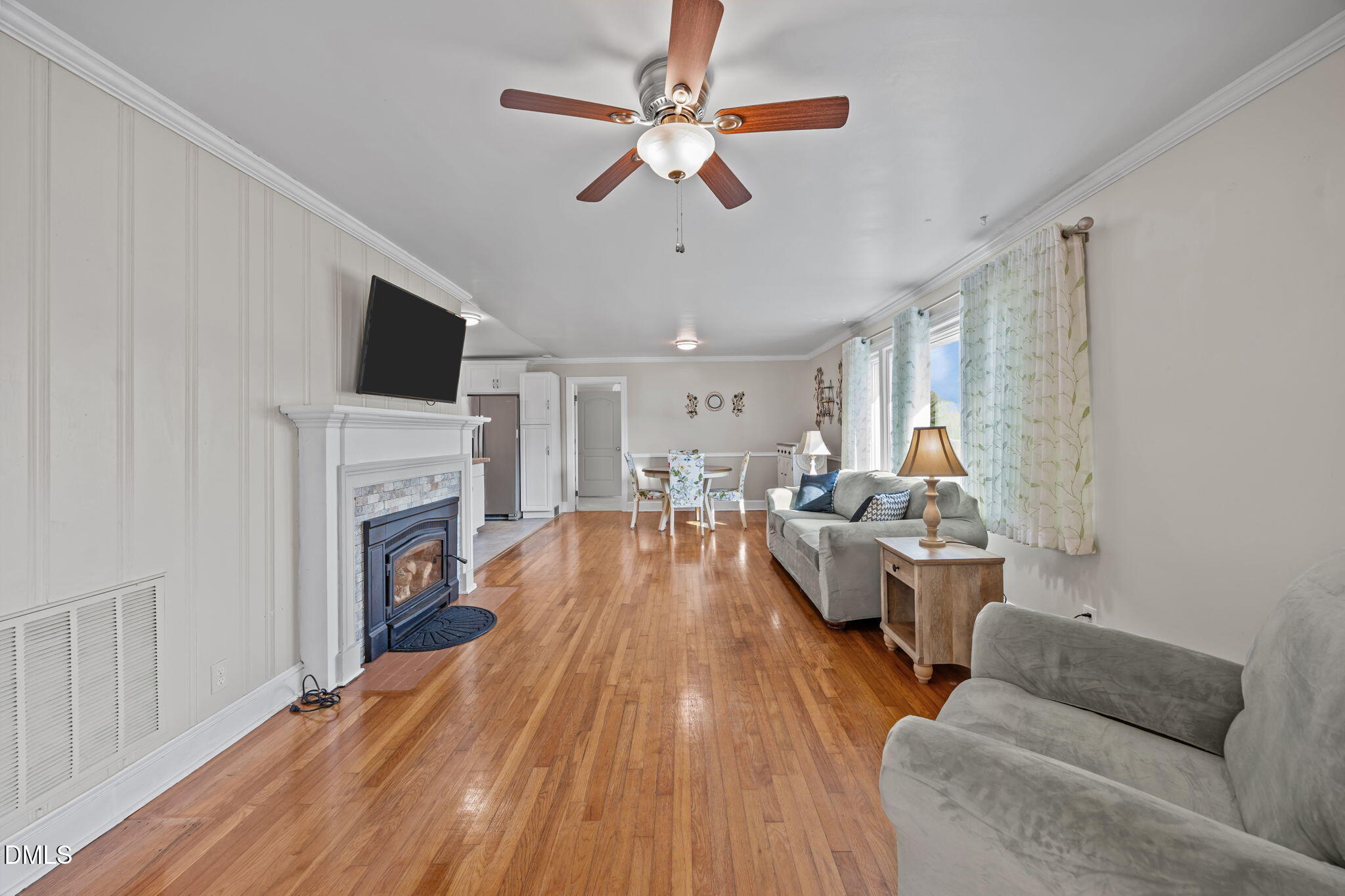 10612 Durham Road Timberlake, NC 27583 - Photo 7 of 42 a living room with furniture and a fireplace