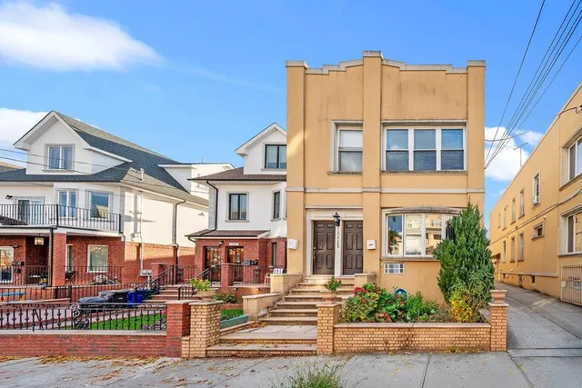 a view of a building with a street