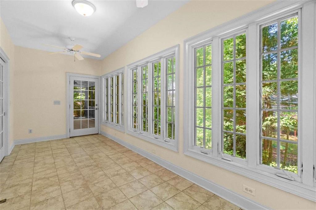 2058 Sewanee Court Villa Rica, GA 30180 - Photo 19 of 81 a view of an empty room with a window and hardwood floor