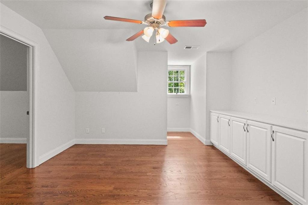 2058 Sewanee Court Villa Rica, GA 30180 - Photo 37 of 81 a view of an empty room with window and wooden floor