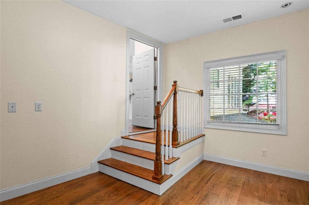 2058 Sewanee Court Villa Rica, GA 30180 - Photo 65 of 81 a view of entryway with wooden floor and window