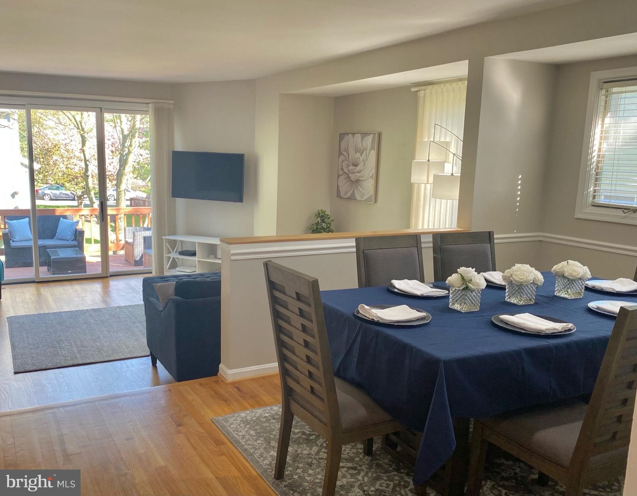 5219 Columbia Road, Unit 662 Columbia, MD 21044 - Photo 5 of 29 Dining/living room and deck