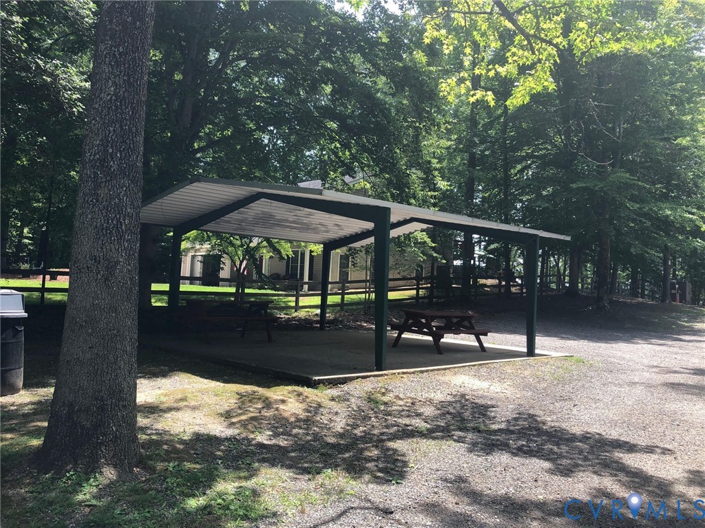 502 Smith Drive Ruther Glen, VA 22546 - Photo 33 of 34 a view of a house with backyard and sitting area