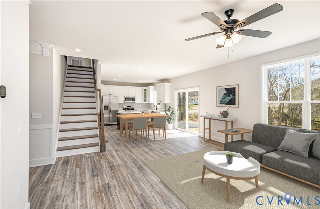 502 Smith Drive Ruther Glen, VA 22546 - Photo 9 of 34 a living room with furniture and a wooden floor