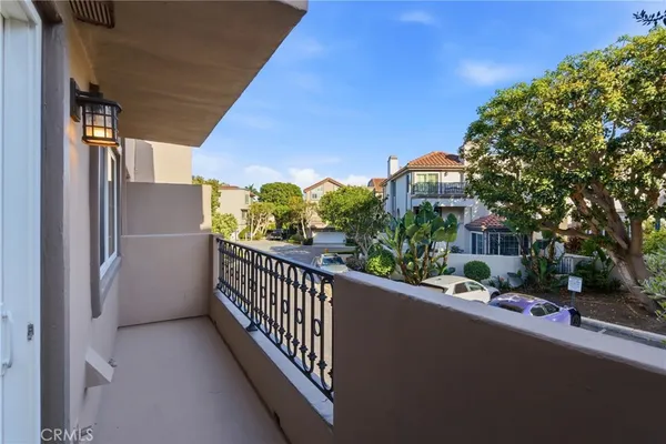 a view of a street from a balcony