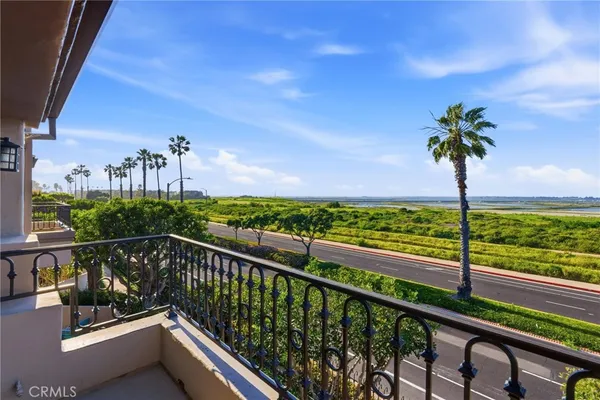 a view of a balcony with chairs
