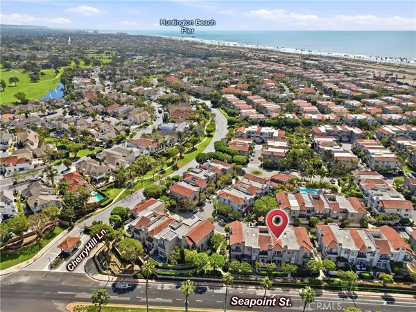 a large bathroom with a sink mirror and a bathtub