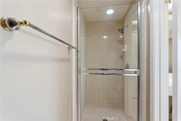 a bedroom with a bed and large closet