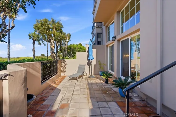 a view of a pathway with a house in the background