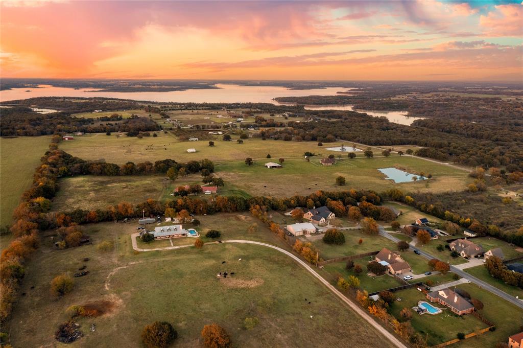 13633 Alexander Road Pilot Point, TX 76258 - Photo 2 of 4 a view of a city