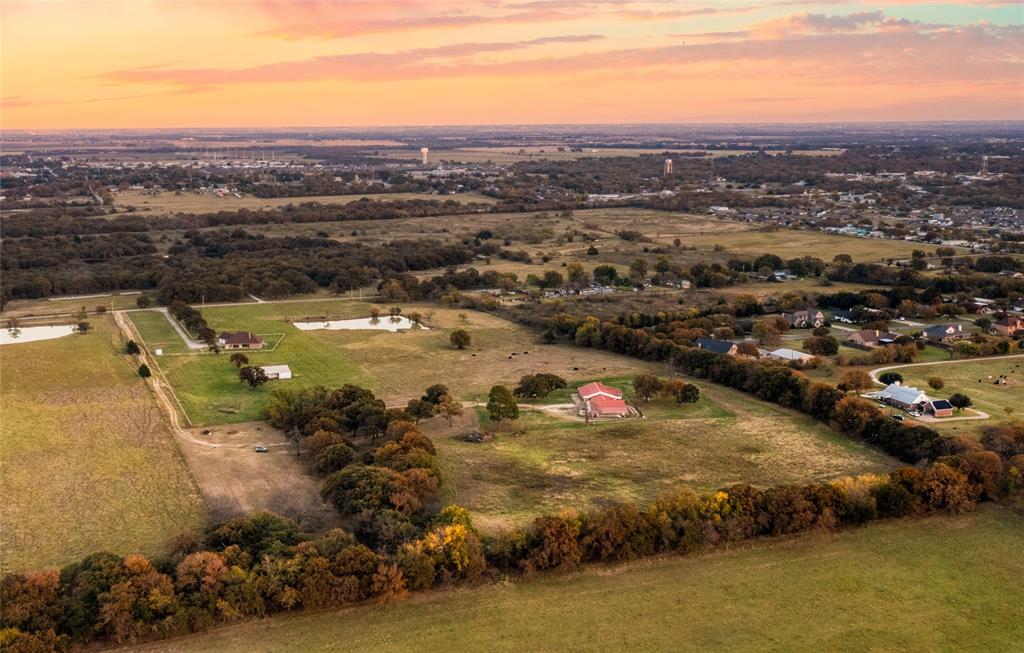 13633 Alexander Road Pilot Point, TX 76258 - Photo 3 of 4 an aerial view of residential houses with outdoor space