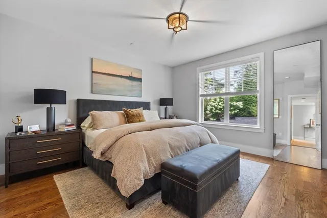 a bedroom with bed and a couch