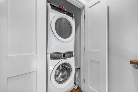 a bathroom with a sink a toilet a shower and a mirror