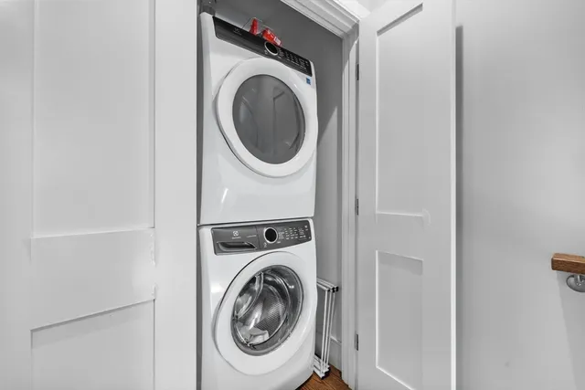 a bathroom with a sink a toilet a shower and a mirror