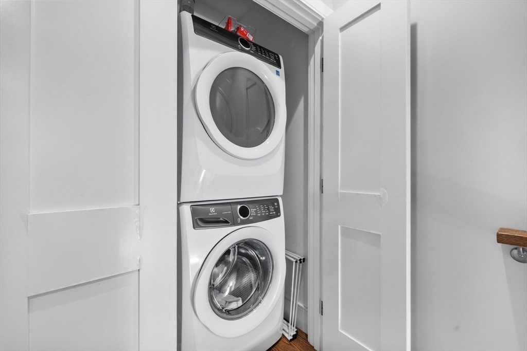 579 Baker Street, Unit 579 Boston, MA 02132 - Photo 19 of 30 a utility room with dryer and washer
