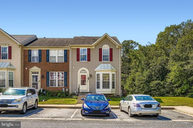 a car parked in front of a house
