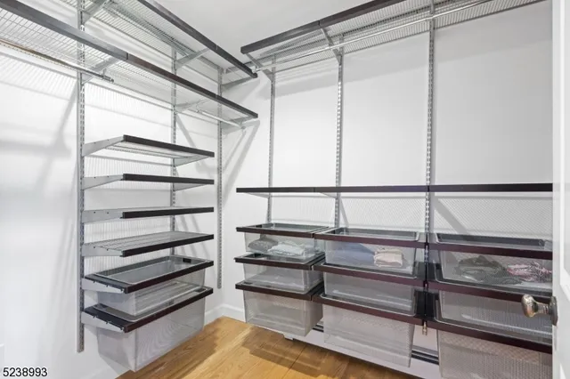 a view of staircase with a rug