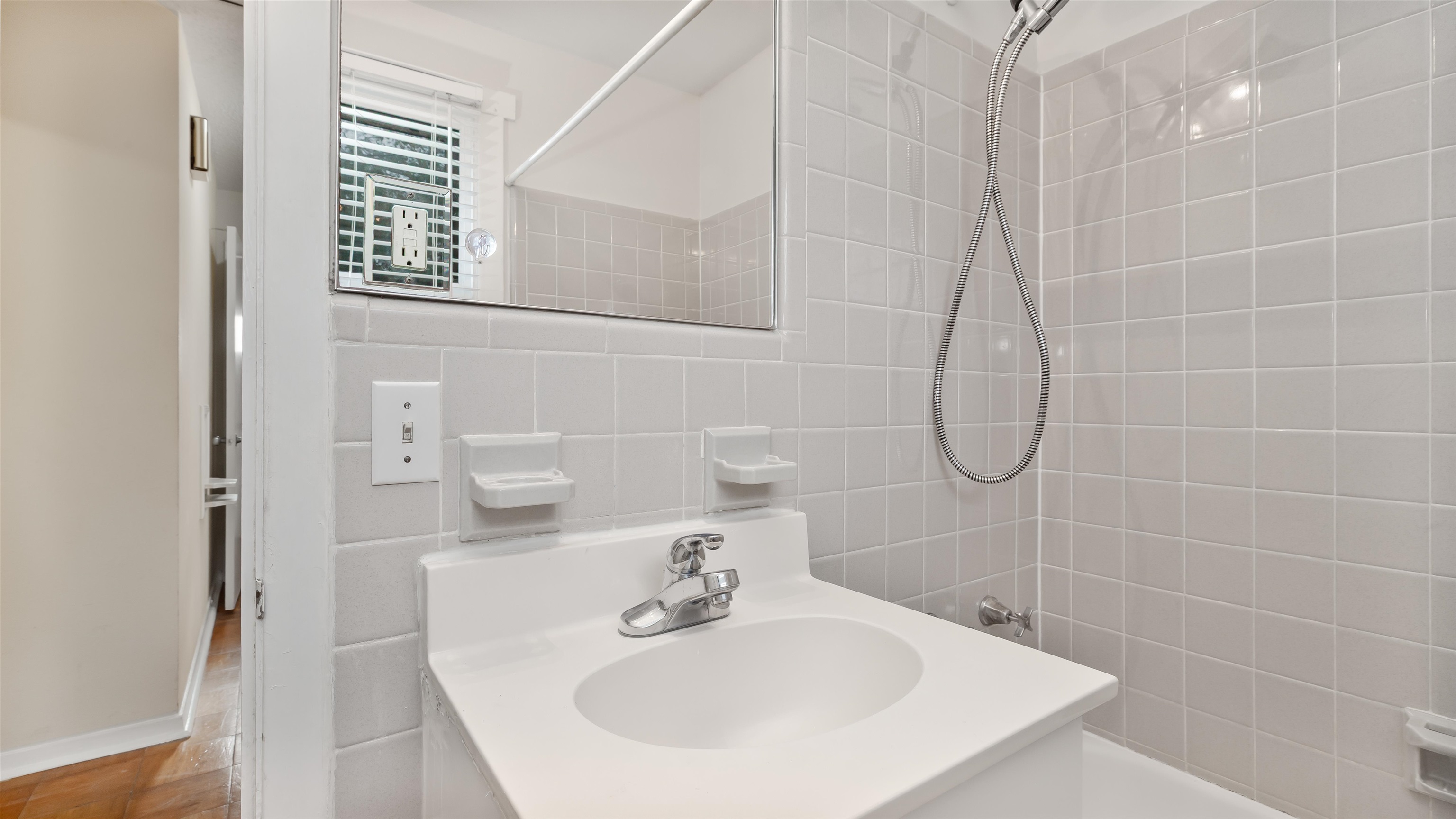 539 Redwood Avenue, Unit 539 Myrtle Beach, SC 29577 - Photo 17 of 42 Full bathroom with vanity, bathing tub / shower combination, and tile walls