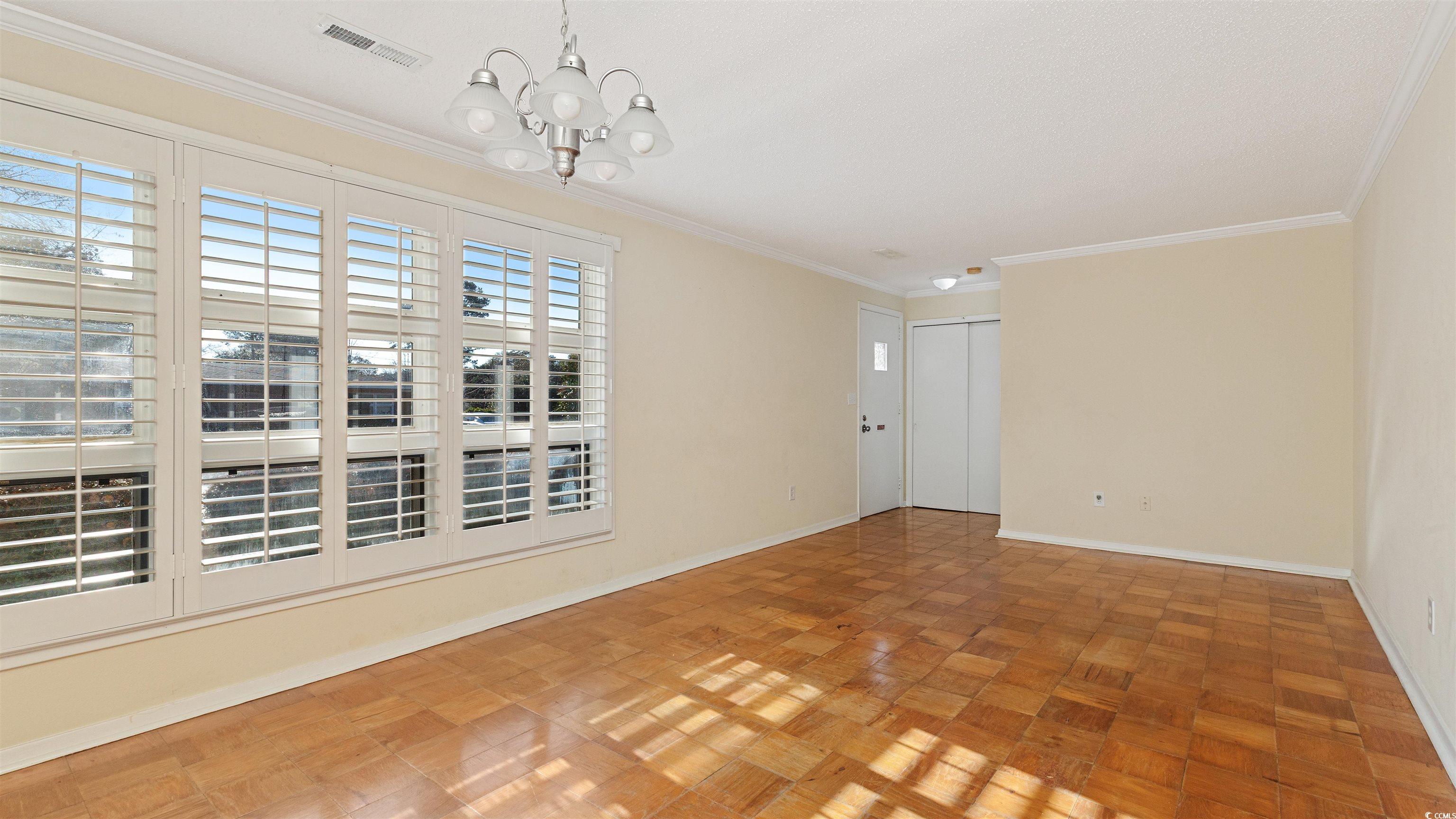 539 Redwood Avenue, Unit 539 Myrtle Beach, SC 29577 - Photo 8 of 42 Windows with natural light. Space is shared with dining area.