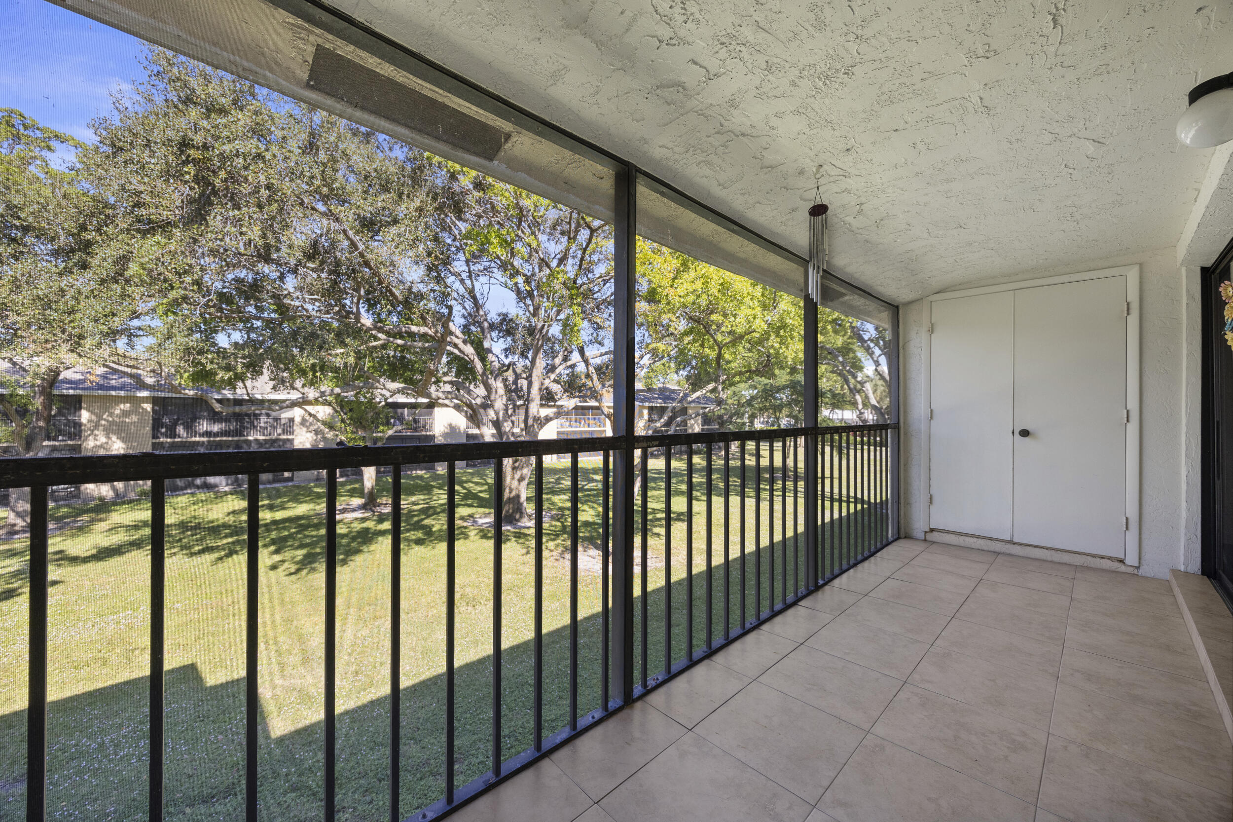 3939 Northeast 5th Avenue, Unit B206 Boca Raton, FL 33431 - Photo 26 of 38 Screened Patio