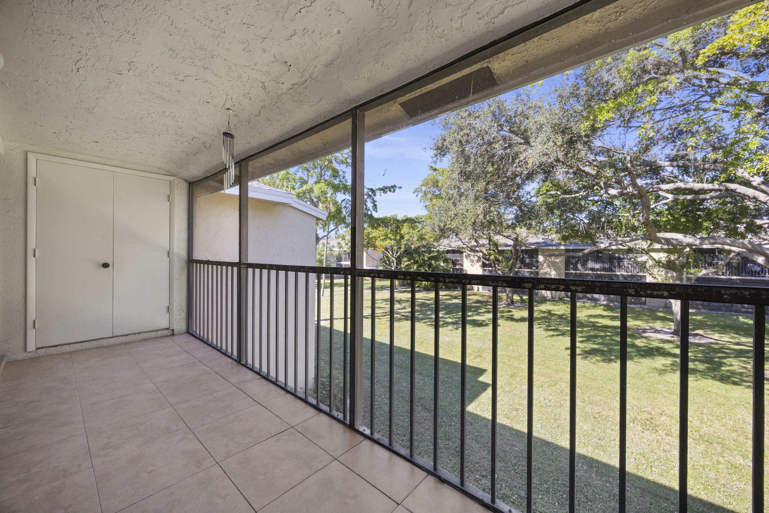 3939 Northeast 5th Avenue, Unit B206 Boca Raton, FL 33431 - Photo 28 of 38 Screened Patio