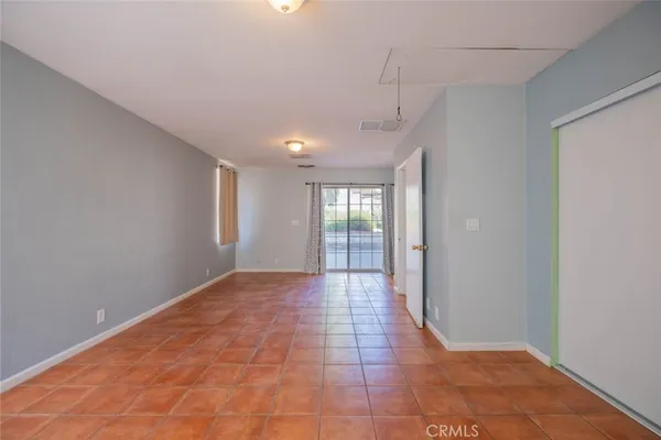 a view of hallway with a window