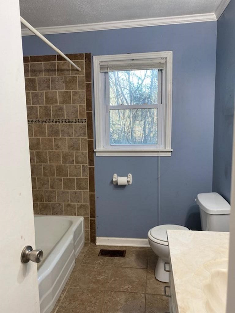 34 Baseline Road Dyer, TN 38330 - Photo 7 of 8 a bathroom with a toilet a bath tub and a shower