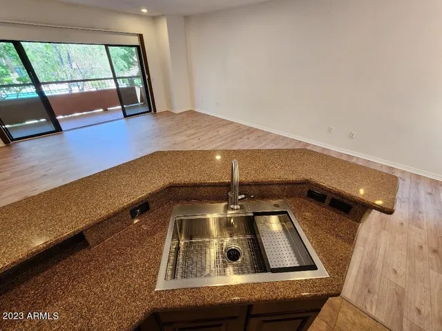 a view of swimming pool with a couch