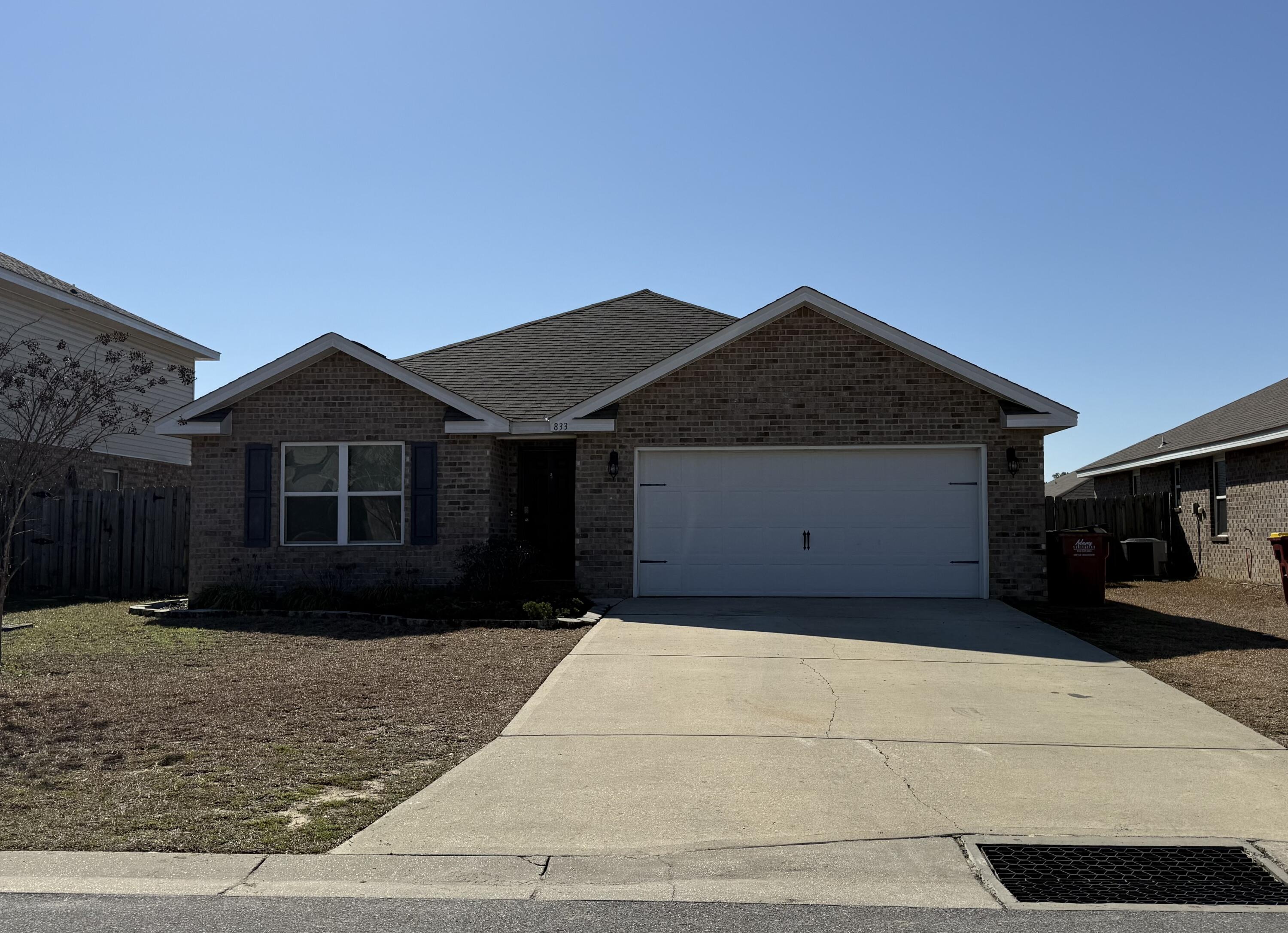 833 Moorhen Way Crestview, FL 32539 - Photo 18 of 18 a front view of a house with a yard
