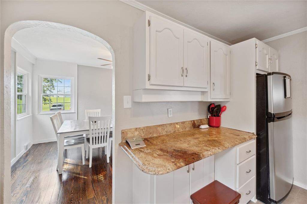 452 Airport Road Butler, PA 16002 - Photo 12 of 45 a kitchen with stainless steel appliances granite countertop a sink refrigerator and cabinets