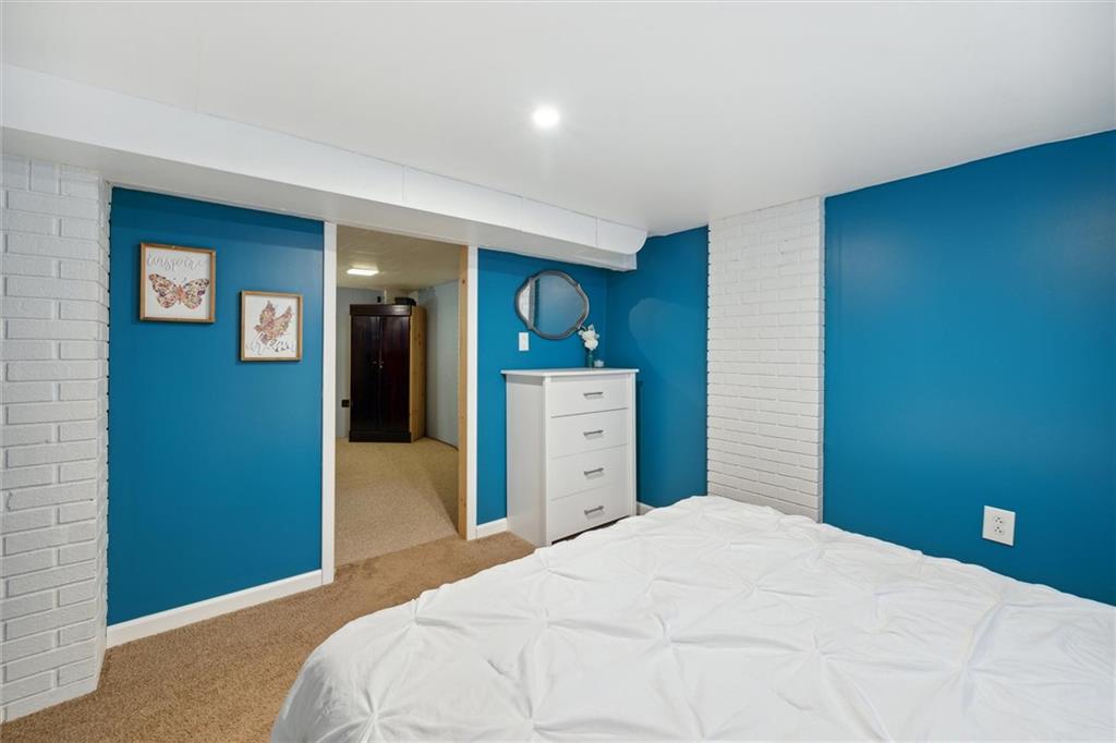 452 Airport Road Butler, PA 16002 - Photo 26 of 45 a bedroom with a bed and dresser