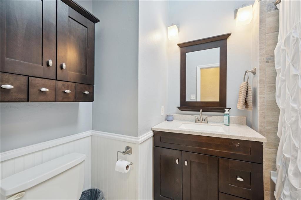 452 Airport Road Butler, PA 16002 - Photo 30 of 45 a bathroom with a double vanity sink and mirror