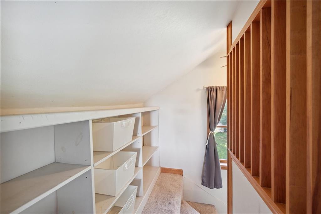 452 Airport Road Butler, PA 16002 - Photo 32 of 45 a view of staircase with railing and white walls