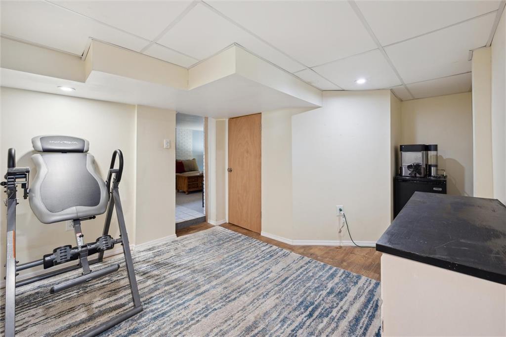 452 Airport Road Butler, PA 16002 - Photo 36 of 45 a view of a room with wooden floor and furniture