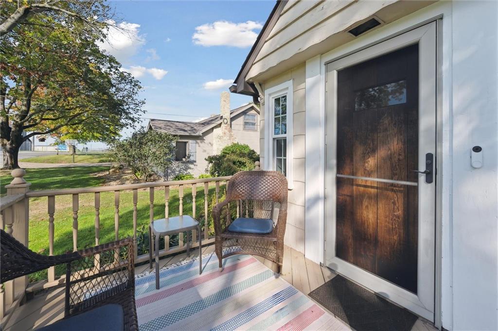 452 Airport Road Butler, PA 16002 - Photo 6 of 45 a view of a porch with furniture and garden