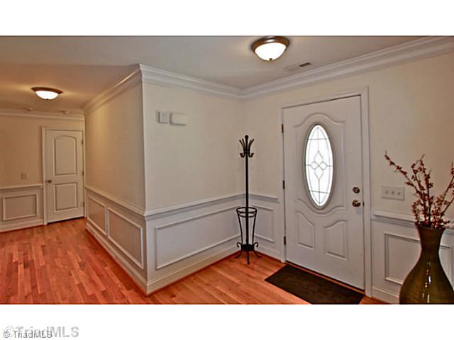 6891 Pritchett Road Browns Summit, NC 27214 - Photo 2 of 16 Entry. Notice all the wainscoting.