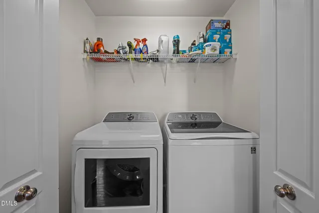 a view of a room with gym equipment and a window
