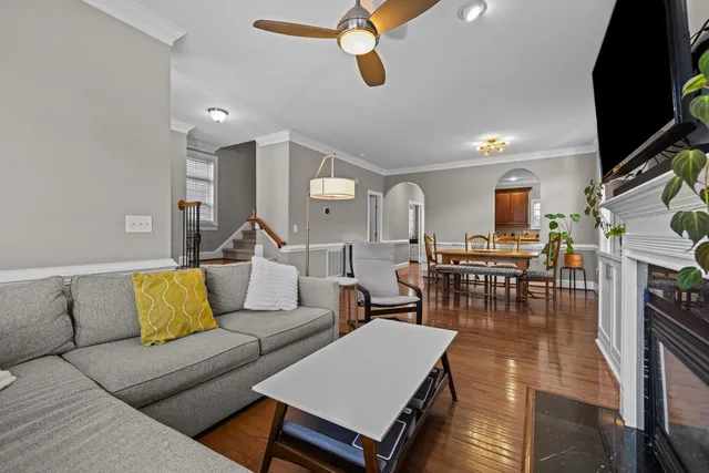 a kitchen with stainless steel appliances granite countertop a stove microwave and sink
