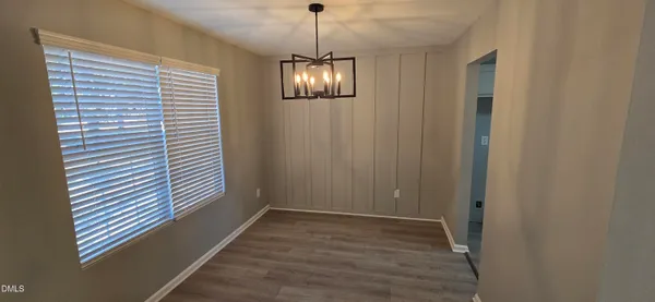 a view of a livingroom with windows