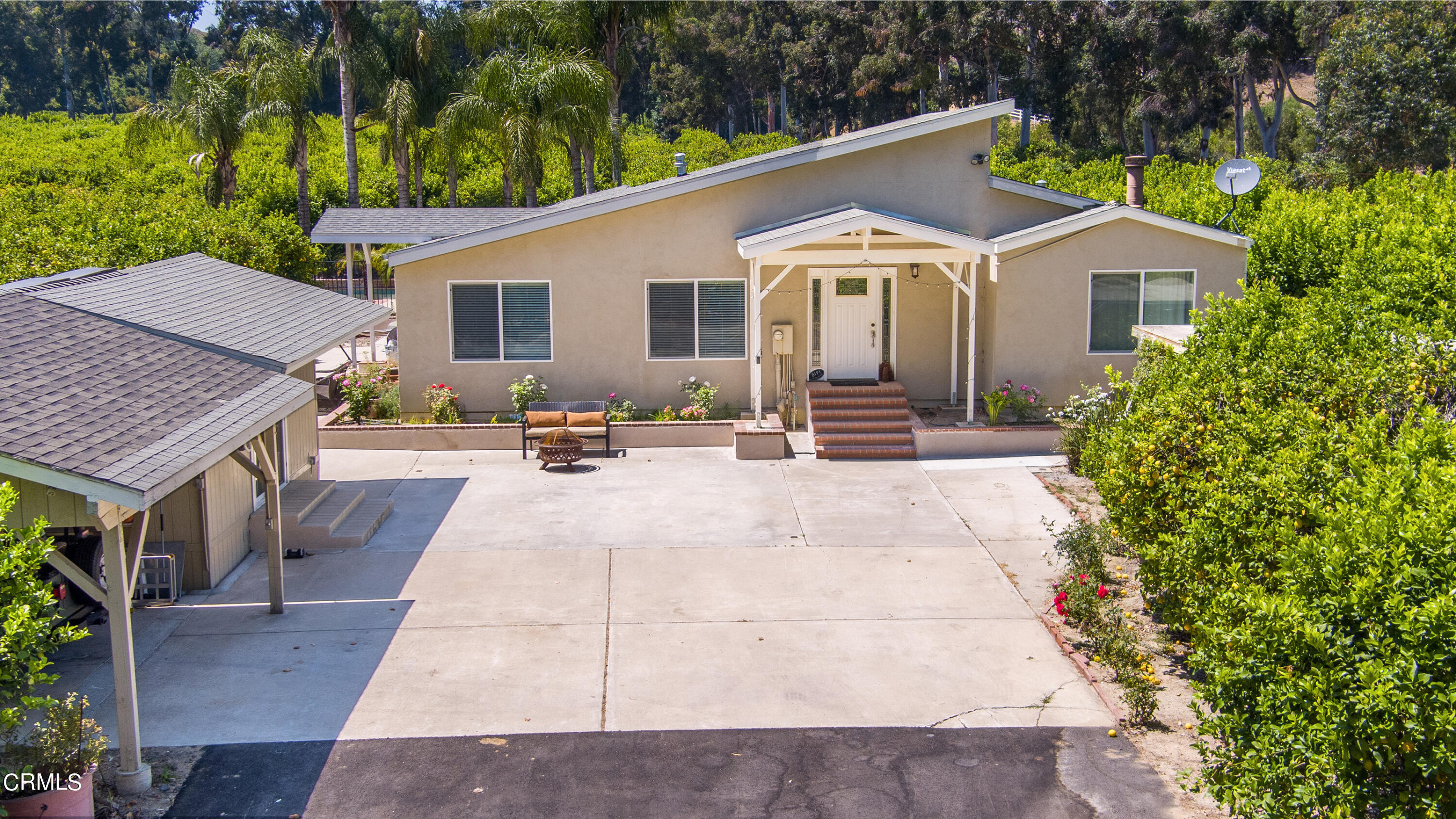 8191 Waters Road Moorpark, CA 93021 - Photo 1 of 13 a view of a house with backyard and sitting area