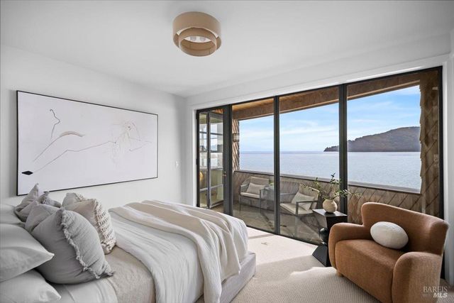 a bathroom with a toilet and a sink