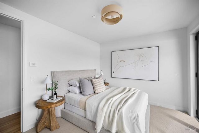 a bathroom with a bathtub shower sink and toilet
